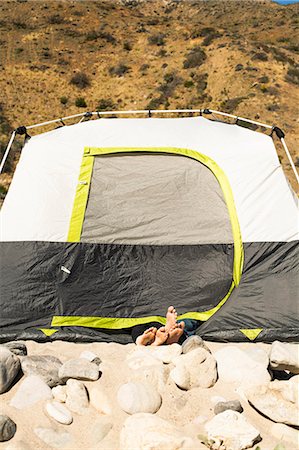 simsearch:614-08119553,k - Couple's feet sticking out of tent, Malibu, California, USA Stock Photo - Premium Royalty-Free, Code: 614-08119554