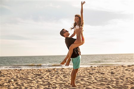 simsearch:614-08119553,k - Couple having fun on beach, Malibu, California, USA Stock Photo - Premium Royalty-Free, Code: 614-08119588