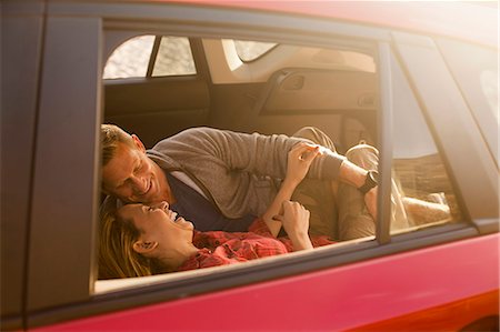 simsearch:614-08119553,k - Couple relaxing inside vehicle Stock Photo - Premium Royalty-Free, Code: 614-08119599