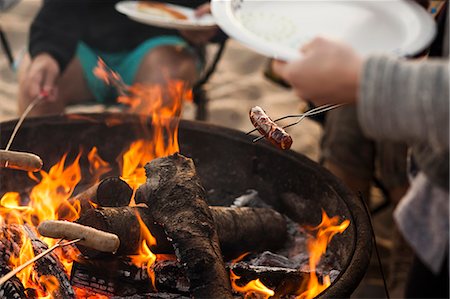 photography people at beach - Group of friends having barbecue on beach Stock Photo - Premium Royalty-Free, Code: 614-08119606