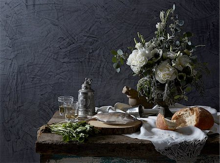 painterly - Still life Dutch masters theme with white wine, watercress, bread and fish Stock Photo - Premium Royalty-Free, Code: 614-08270083