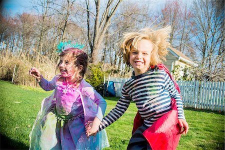 simsearch:649-06845253,k - Children in costumes playing outdoors Stock Photo - Premium Royalty-Free, Code: 614-08270169