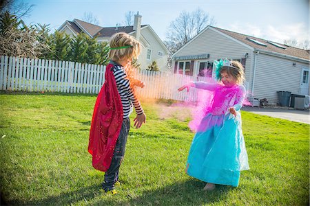 simsearch:649-06845253,k - Children in costumes playing outdoors Stock Photo - Premium Royalty-Free, Code: 614-08270162