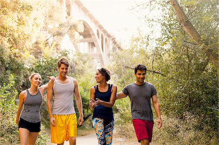 simsearch:614-08307669,k - Joggers walking and chatting, Arroyo Seco Park, Pasadena, California, USA Stock Photo - Premium Royalty-Free, Code: 614-08307676