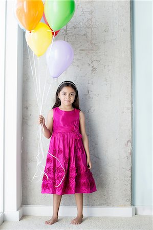 simsearch:614-07768068,k - Portrait of young girl holding balloons Stock Photo - Premium Royalty-Free, Code: 614-08329252
