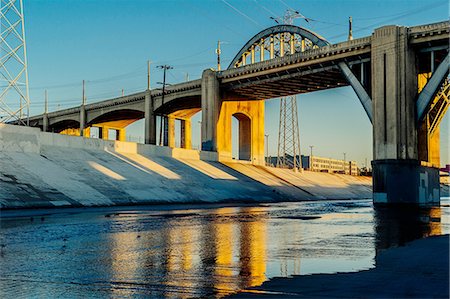 embankment - Sunlight on Los Angeles river embankment and 6th street bridge, Los Angeles, California, USA Stock Photo - Premium Royalty-Free, Code: 614-08329558