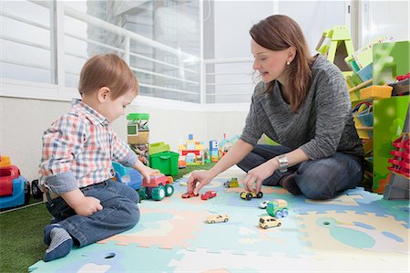 Mother playing with son at home Stock Photo - Premium Royalty-Free, Code: 614-08392320