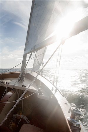sea and yacht - Yacht on ocean in sunlight Stock Photo - Premium Royalty-Free, Code: 614-08392384