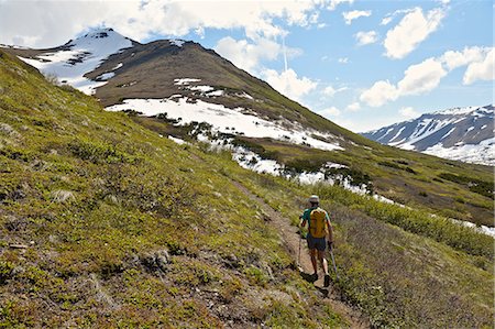 simsearch:614-07240106,k - Female mountain climber walking uphill, rear view, Chugach State Park, Anchorage, Alaska, USA Stock Photo - Premium Royalty-Free, Code: 614-08392434