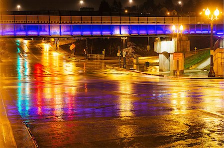 rain in city - Footbridge over wet city road at night, Tacoma, Washington, USA Stock Photo - Premium Royalty-Free, Code: 614-08487996