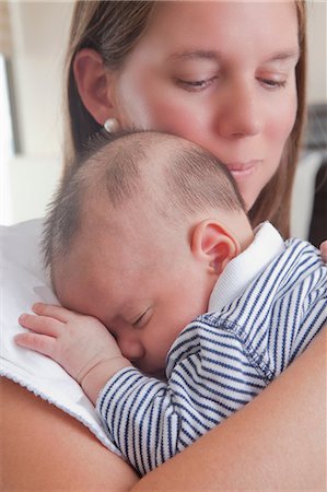 simsearch:614-07031850,k - Mother holding sleeping baby boy Stock Photo - Premium Royalty-Free, Code: 614-08684700