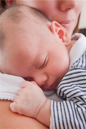 simsearch:614-07031844,k - Mother holding sleeping baby boy Stock Photo - Premium Royalty-Free, Code: 614-08684701