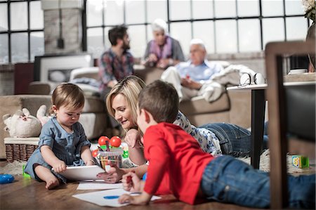 Mother and children drawing at home Stock Photo - Premium Royalty-Free, Code: 614-08726570