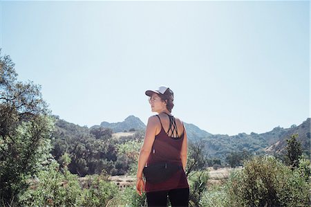 simsearch:614-06625125,k - Rear view of woman in the mountains looking away, Malibu, California, USA Stock Photo - Premium Royalty-Free, Code: 614-08721022