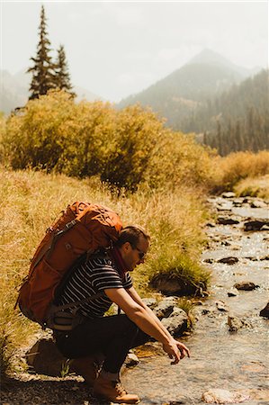 simsearch:614-09078761,k - Man wearing backpack, sitting by creek, Mineral King, Sequoia National Park, California, USA Stock Photo - Premium Royalty-Free, Code: 614-08826893