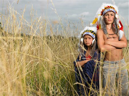 preteen girl topless - Kids dressed up as north american indian Stock Photo - Premium Royalty-Free, Code: 614-08865736
