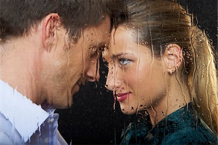 simsearch:649-05556305,k - Couple behind rain covered window Stock Photo - Premium Royalty-Free, Code: 614-08865802