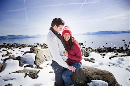 simsearch:6113-07790711,k - Couple sitting by snowy lake laughing Photographie de stock - Premium Libres de Droits, Code: 614-08866213