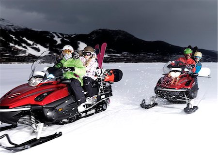 simsearch:614-06624830,k - Two couples riding skidoos. Stock Photo - Premium Royalty-Free, Code: 614-08866499