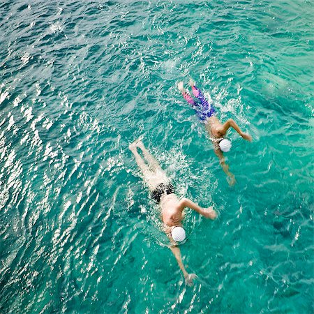 simsearch:614-06624830,k - Men swimming in sea Stock Photo - Premium Royalty-Free, Code: 614-08866551