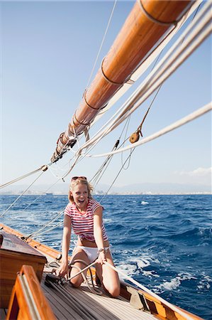 simsearch:614-00602699,k - woman holding on to ropes on deck Stock Photo - Premium Royalty-Free, Code: 614-08866805