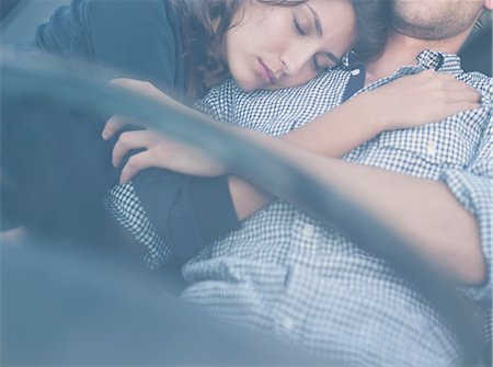 simsearch:614-06896253,k - couple lying in open-topped car Stock Photo - Premium Royalty-Free, Code: 614-08866800