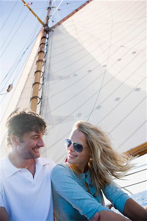 simsearch:614-00602699,k - couple on a sailing boat smiling Stock Photo - Premium Royalty-Free, Code: 614-08866834