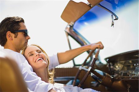 simsearch:614-06896253,k - Young couple driving convertible Stock Photo - Premium Royalty-Free, Code: 614-08867468