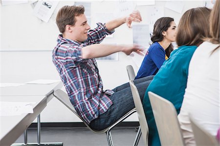 falling - Student tilting chair back in class Stock Photo - Premium Royalty-Free, Code: 614-08869155