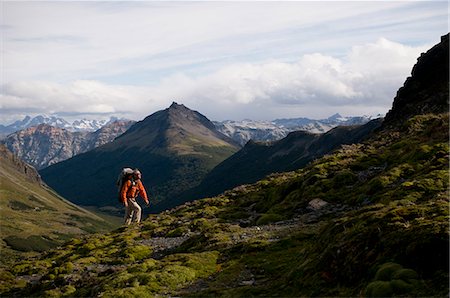 simsearch:614-06625125,k - Hiker walking in grassy hills Stock Photo - Premium Royalty-Free, Code: 614-08869201