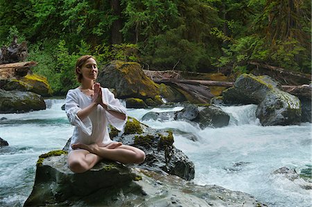 simsearch:614-08065889,k - Woman meditating on rock by water Stock Photo - Premium Royalty-Free, Code: 614-08874150