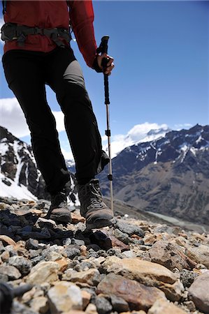 Woman navigates scree below the lookout point at Cerro Electrico, El Chalten, Argentina Stock Photo - Premium Royalty-Free, Code: 614-08874176