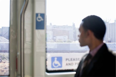 simsearch:614-06897927,k - Businessman on a train, looking through window Foto de stock - Sin royalties Premium, Código: 614-08874207