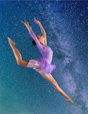 simsearch:400-06481645,k - Ballerina leaping against starry night sky Stock Photo - Premium Royalty-Free, Code: 614-08874274