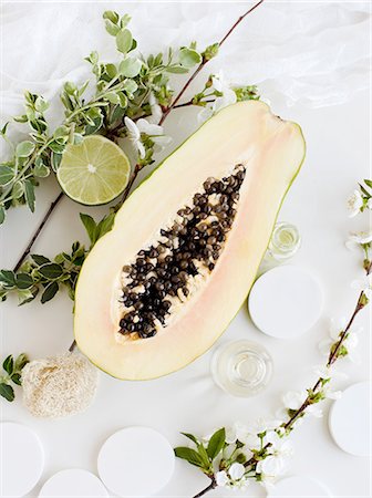 still life white - Aromatic still life with papaya, blossom and lime Stock Photo - Premium Royalty-Free, Code: 614-08874961