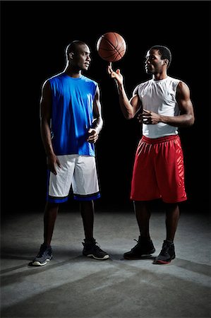 Studio shot of two basketball players Stock Photo - Premium Royalty-Free, Code: 614-08875678