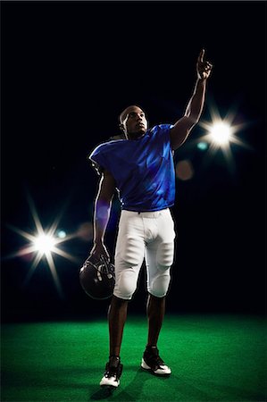 simsearch:614-06896861,k - Portrait of american football player pointing finger Stock Photo - Premium Royalty-Free, Code: 614-08875717