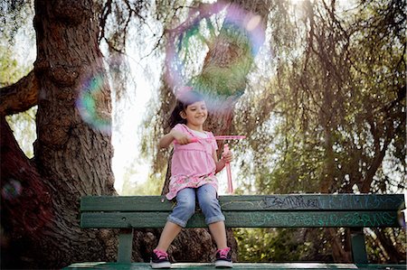 simsearch:614-07768068,k - Girl playing with soap bubbles Stock Photo - Premium Royalty-Free, Code: 614-08875869