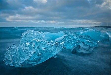 simsearch:633-06322603,k - Close up of iceberg on beach, Jokulsarlon, Iceland Stock Photo - Premium Royalty-Free, Code: 614-08876022