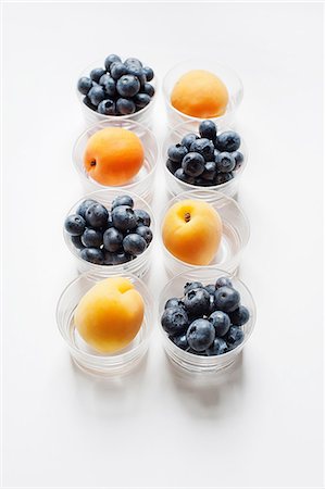 simsearch:614-01088098,k - Still life with rows of apricots and blueberries in glass tumblers Stock Photo - Premium Royalty-Free, Code: 614-08876147