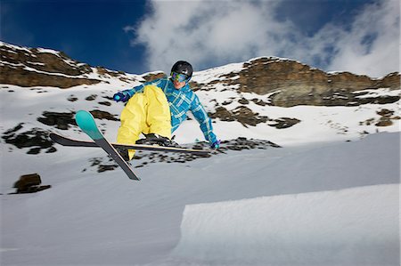 simsearch:649-07437947,k - Male skier mid air with crossed skis Stock Photo - Premium Royalty-Free, Code: 614-08876170
