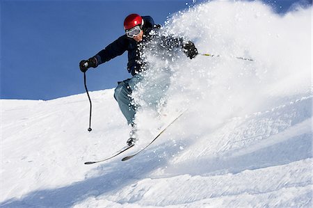 simsearch:649-07437947,k - Man skiing at speed Stock Photo - Premium Royalty-Free, Code: 614-08876188