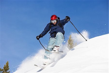 simsearch:614-06625125,k - Man skiing at speed down mountain Stock Photo - Premium Royalty-Free, Code: 614-08876189