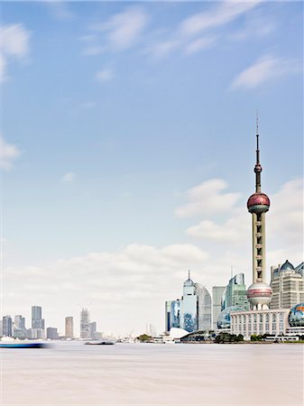 simsearch:841-06447202,k - Pudong skyline and the Bund on river Huangpu, Shanghai, China Stock Photo - Premium Royalty-Free, Code: 614-08876909