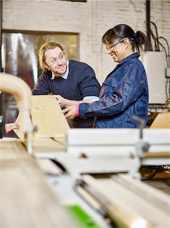 simsearch:649-07710266,k - Man and female trainee preparing wood plank in printing workshop Stock Photo - Premium Royalty-Free, Code: 614-08877295