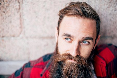 person thinking - Portrait of man with beard looking away Stock Photo - Premium Royalty-Free, Code: 614-08877431