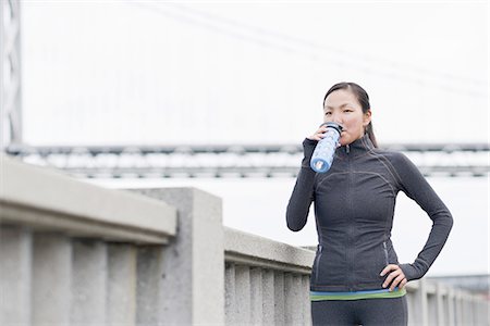 simsearch:614-08307669,k - Female runner drinking on bridge, San Francisco, California Stock Photo - Premium Royalty-Free, Code: 614-08877441