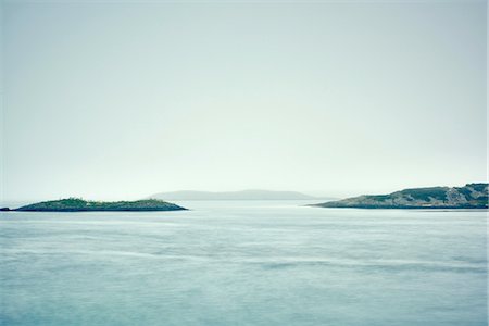simsearch:614-06814364,k - Misty view across water of rocky islands, Haugesund, Rogaland County, Norway Stock Photo - Premium Royalty-Free, Code: 614-08878137