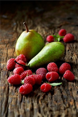 simsearch:614-01088098,k - Pears and raspberries on old wooden surface Stock Photo - Premium Royalty-Free, Code: 614-08878310