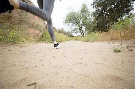 simsearch:614-08307669,k - Jogger running in park, Stoney Point, Topanga Canyon, Chatsworth, Los Angeles, California, USA Stock Photo - Premium Royalty-Free, Code: 614-08878347